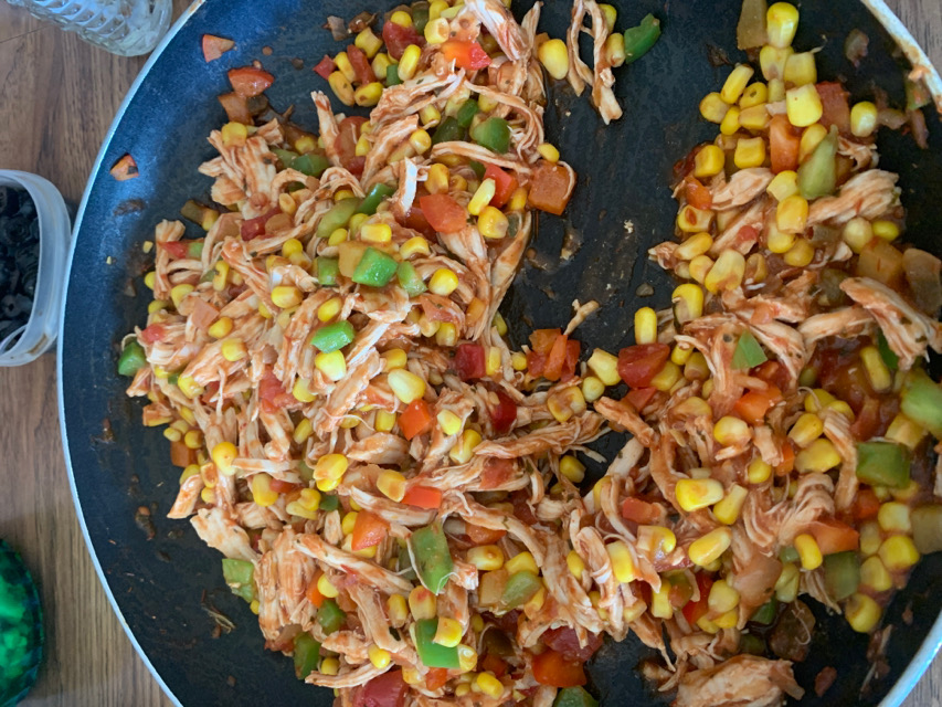 Shredded chicken and corn tostadas