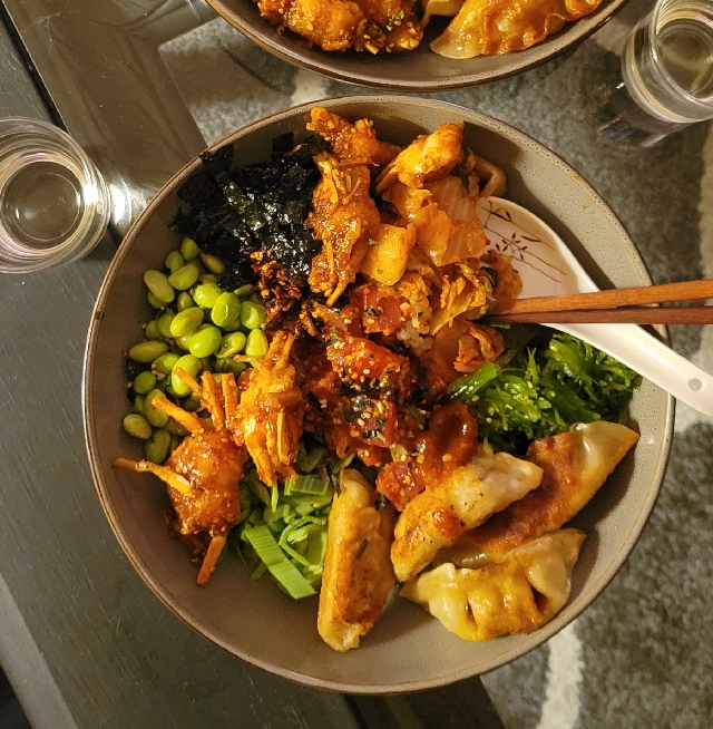Homemade poke bowl with salmon & dumplings