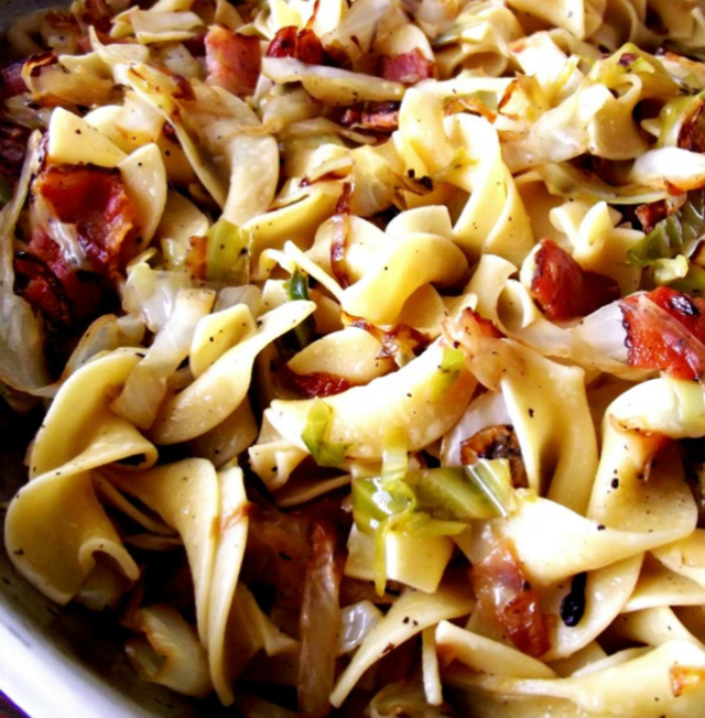Fried cabbage with bacon and noodles