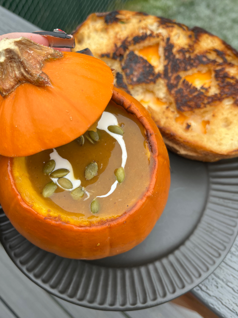 Pumpkin soup inside a pumpkin!