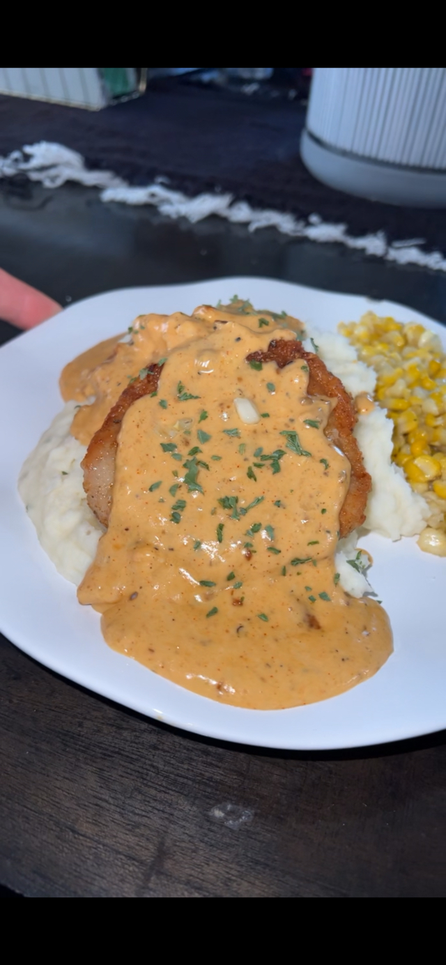 Pan fried pork chop w/ creamy garlic sauce