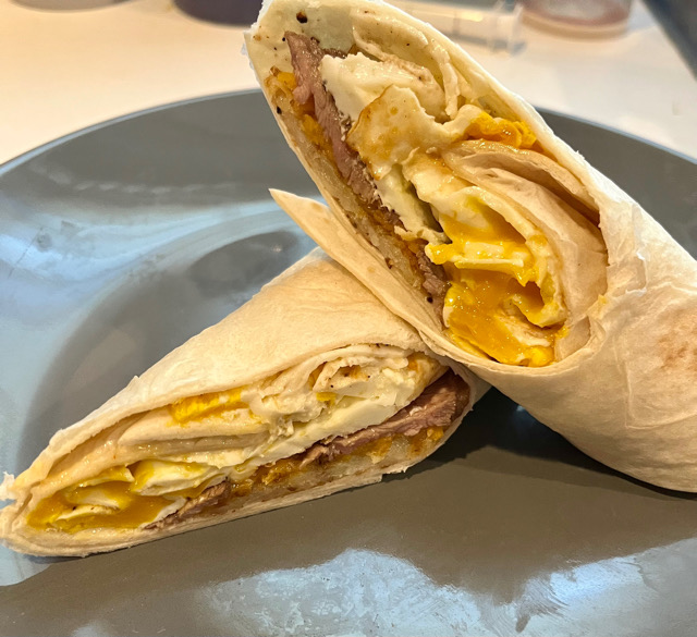 Steak eggs hashbrowns chipotle burrito