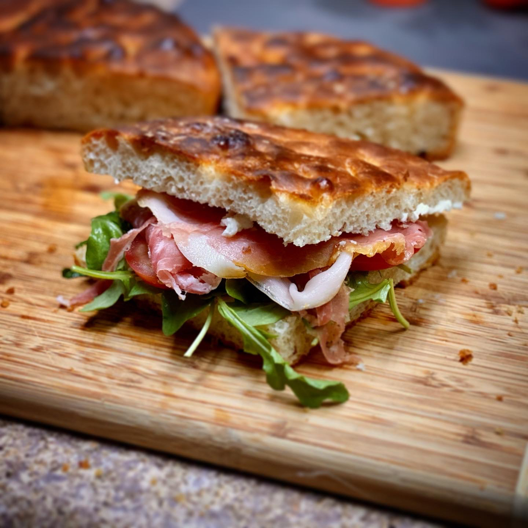 Prosciutto arugula focaccia sandwich
