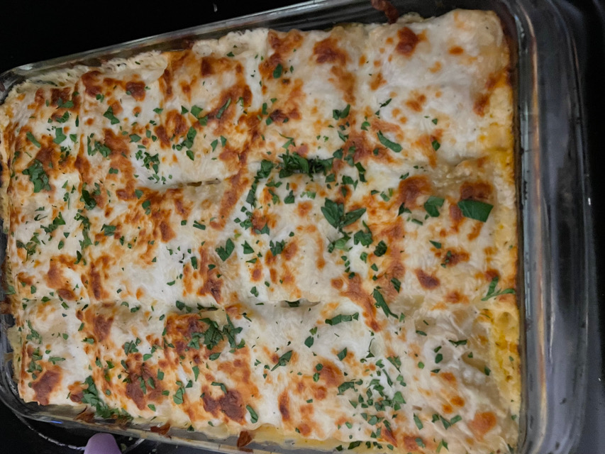 Creamy shredded chicken lasagna roll ups