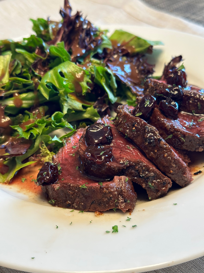 Venison Backstrap w. Red Wine Cherry Sauce