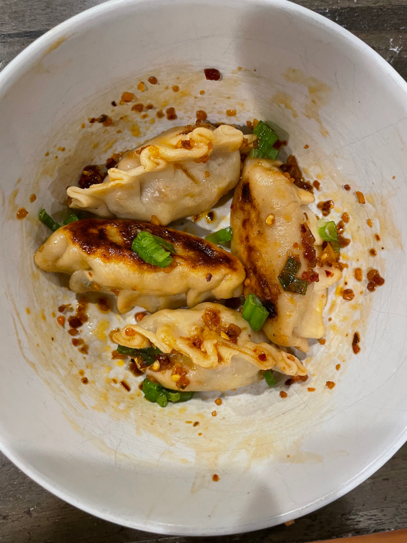 pork potstickers with a spicy chili sauce